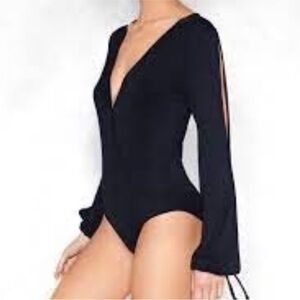 Nasty Gal black Top / get your slit together bodysuit